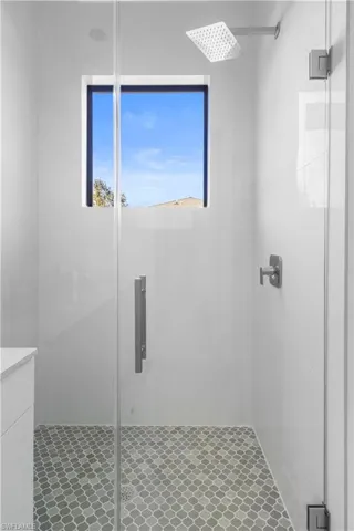 Bathroom featuring a stall shower