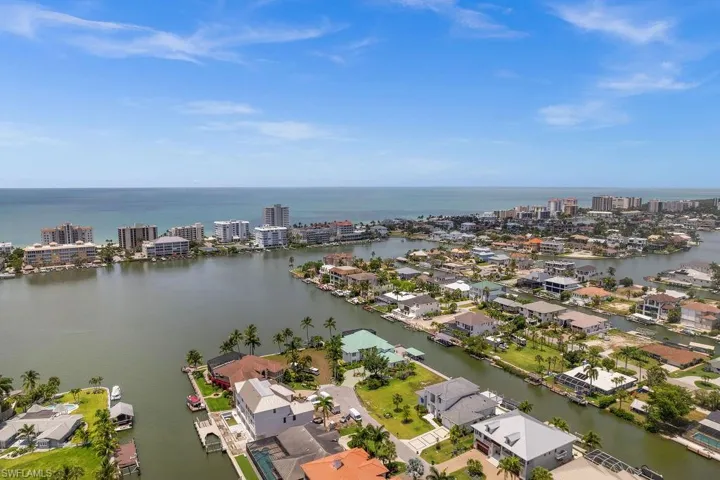 Aerial view of property with bay and gulf views