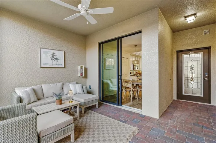 Outdoor Living room with ceiling fan