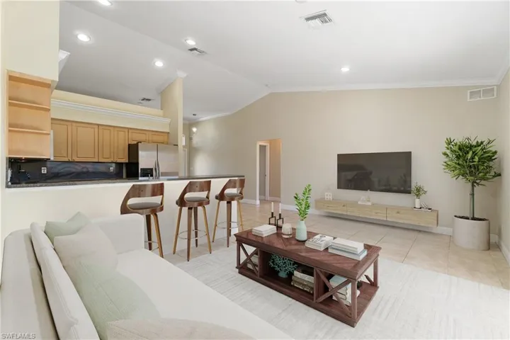 Room has been virtually staged to showcase potential furniture design layout.