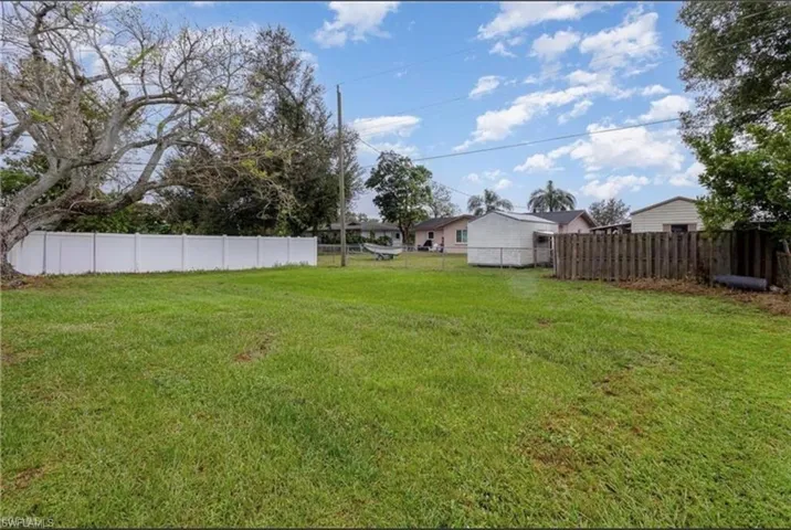 View of fenced backyard