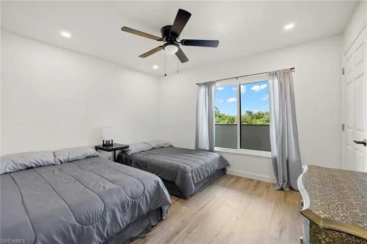 Second bedroom with new recessed lighting & vinyl flooring