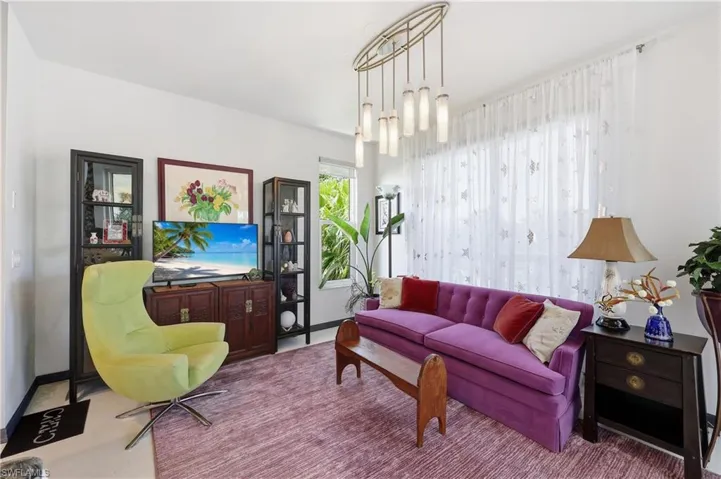 Dining area currently set up as living space
