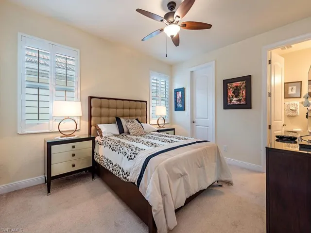 2nd Master Bedroom featuring light colored carpet and ceiling fan