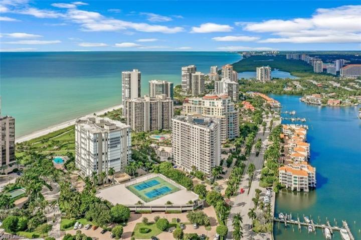 Miles of sandy white beaches in Naples are literally across the street from this residence!