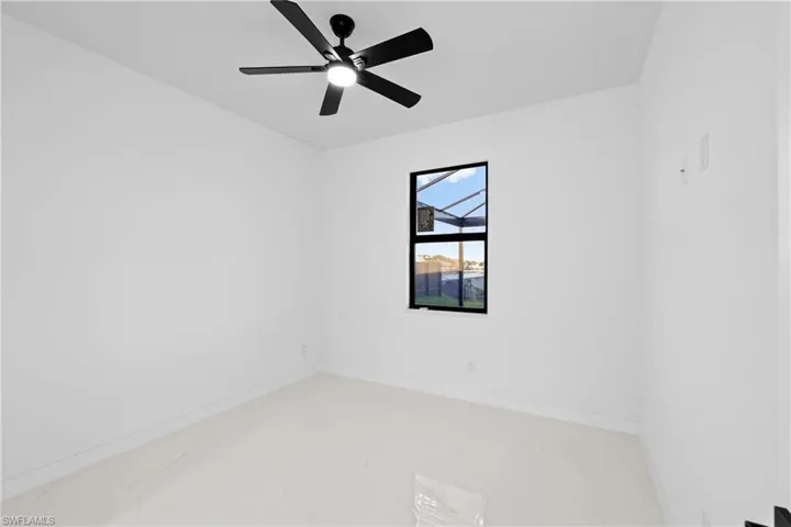 Spare room featuring ceiling fan