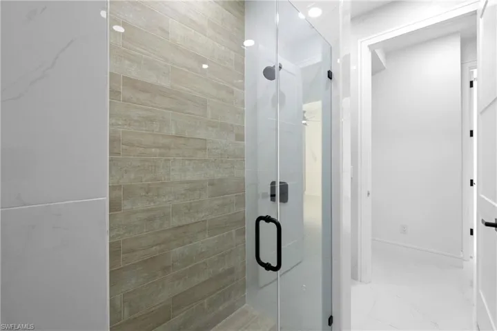 Bathroom featuring walk in shower