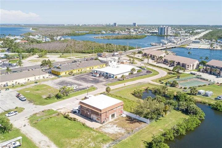 Bird's eye view of a nearby body of water and a notable bridge