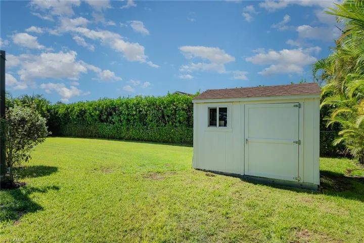 View of yard with a shed