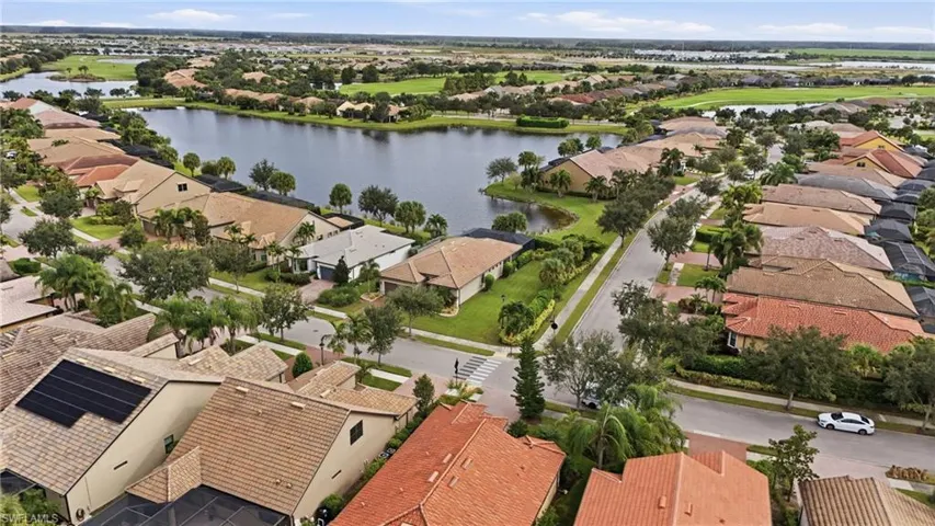 Aerial view of residential area with a large body of water