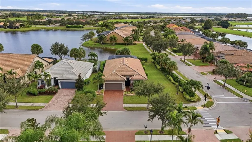 Aerial view of residential area with a nearby body of water