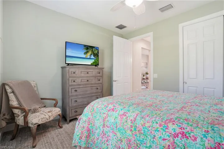 Bedroom featuring a ceiling fan