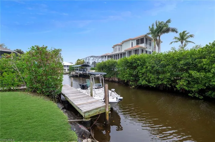 Canal front lot/home ready for your improvements!