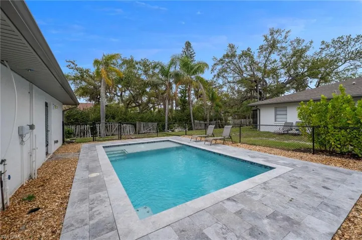 Relax in your pool while enjoying cocktails with friends and family.