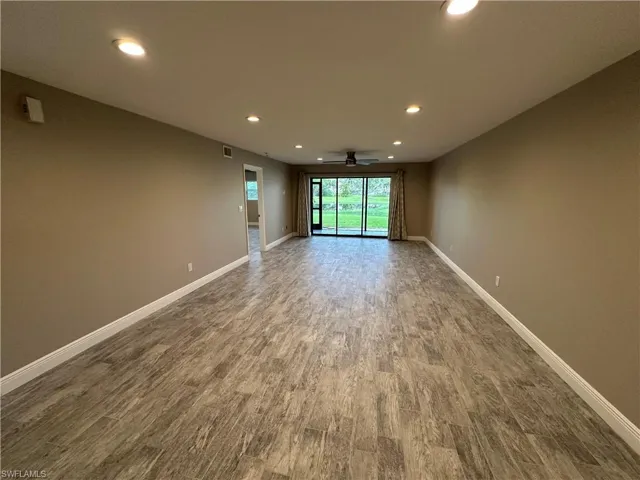 Unfurnished room featuring recessed lighting, wood finished floors, and a ceiling fan