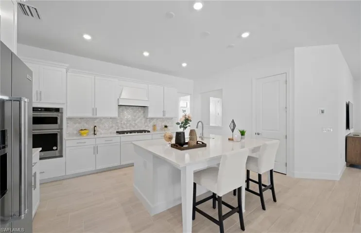 Photos are from a completed home of the same model. Options for this home may vary.