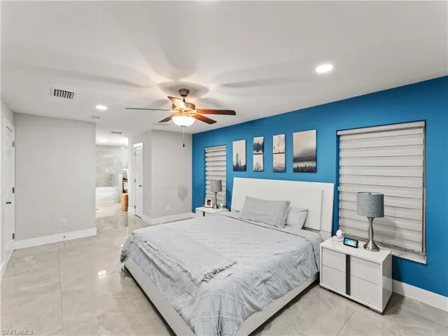 Bedroom featuring recessed lighting and a ceiling fan