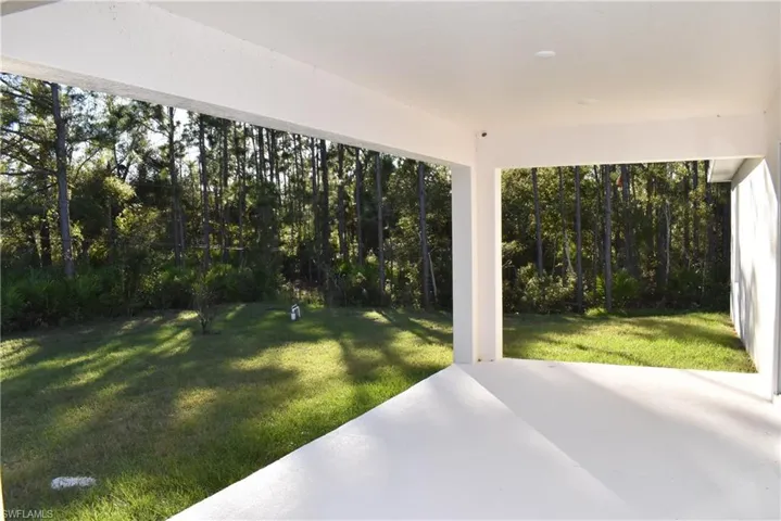 View of yard with a patio