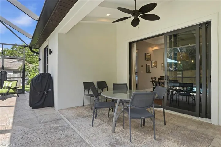 Covered outdoor dining space perfect for al fresco meals.