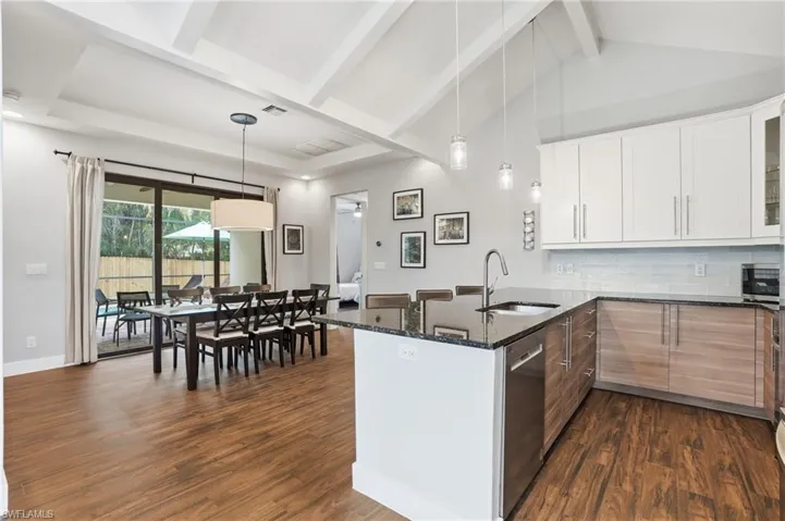 The kitchen is open to the living and dining room for perfect open concept living.