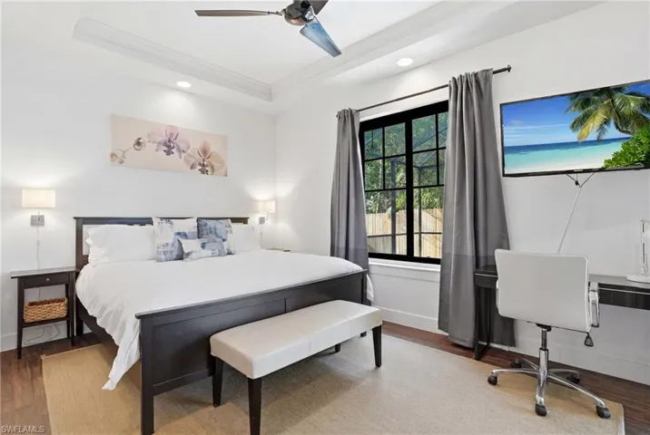 Large, comfortable primary retreat with peaceful backyard views.