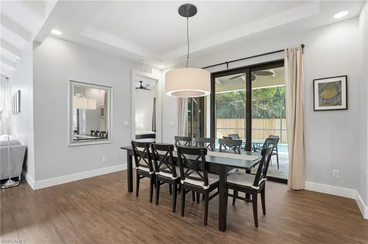 Open dining and living spaces offer a bright, welcoming atmosphere with effortless indoor-outdoor living.