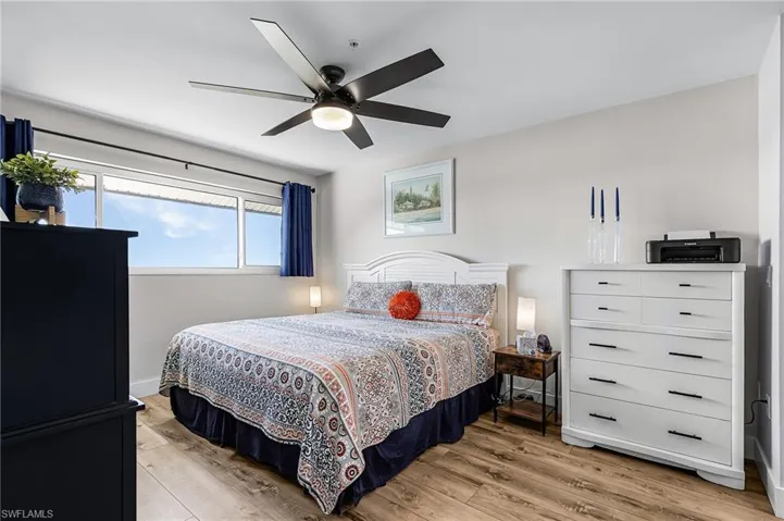 Bedroom featuring light wood-style flooring and ceiling fan