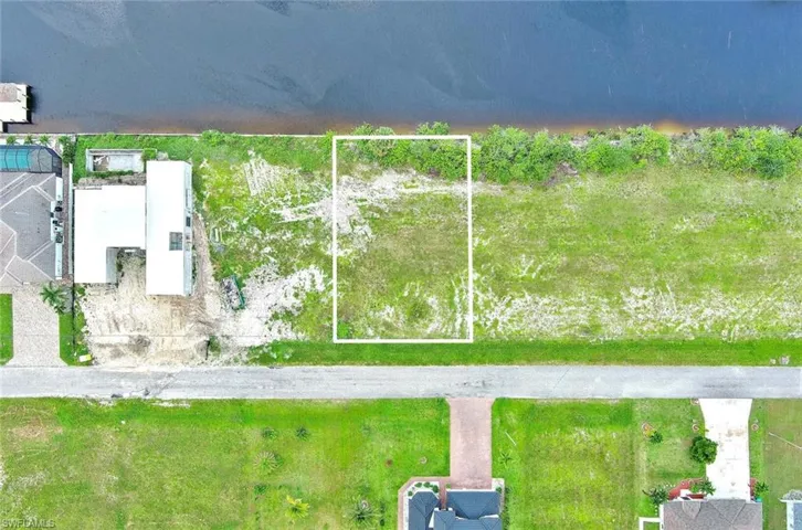 Aerial view of property's location with property parcel outlined
