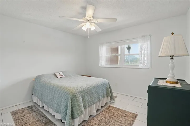 GUEST BEDROOM SUITE WITH POCKET DOOR - IMPACT WINDOW