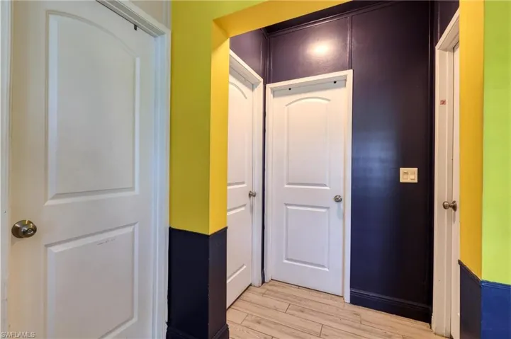 Hall featuring light hardwood / wood-style flooring