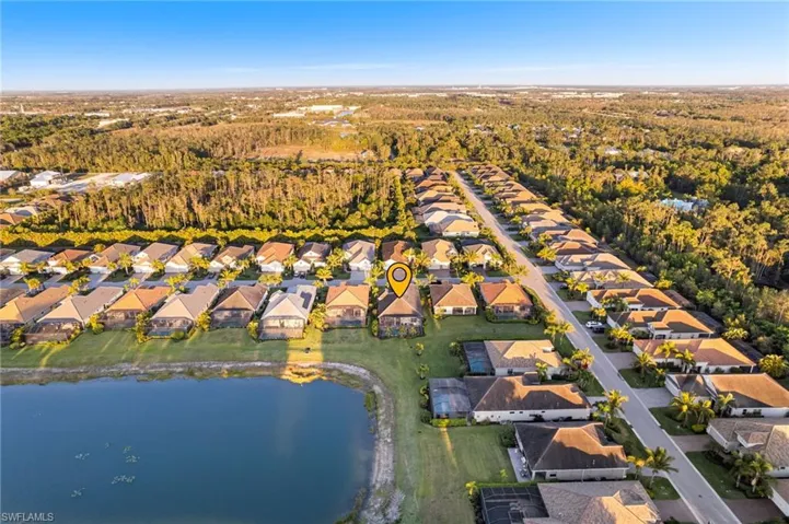 Bird's eye view with a residential view and a water view