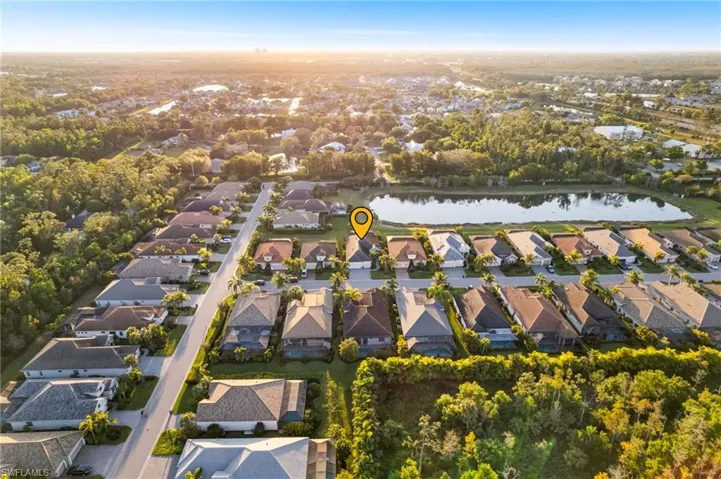 Aerial view with a residential view and a water view