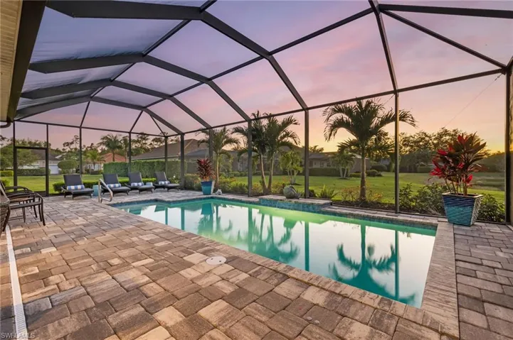 Pool featuring a lanai and a patio area