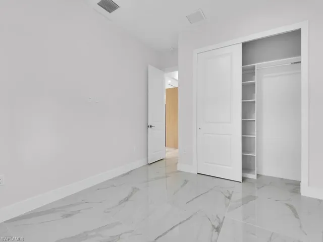 bedroom 3 with a closet