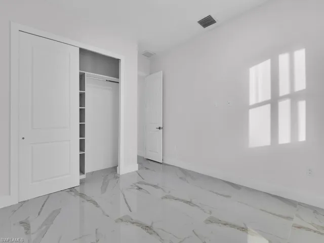 bedroom 2 with a closet