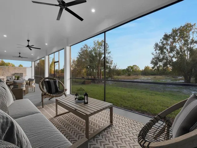 terrace with screened lanai, featuring an outdoor kitchen, backyard, 3 ceiling fans, furnitures are not included.