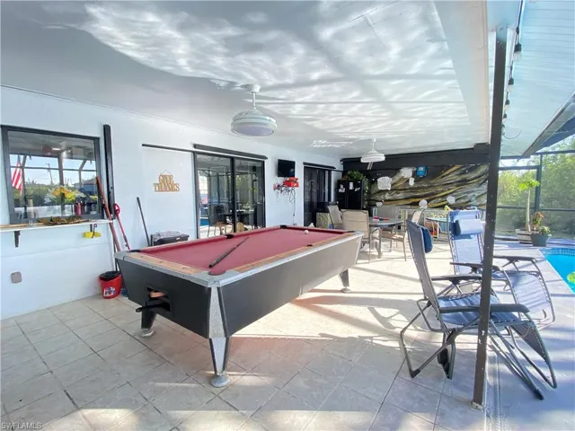 Playroom with pool table