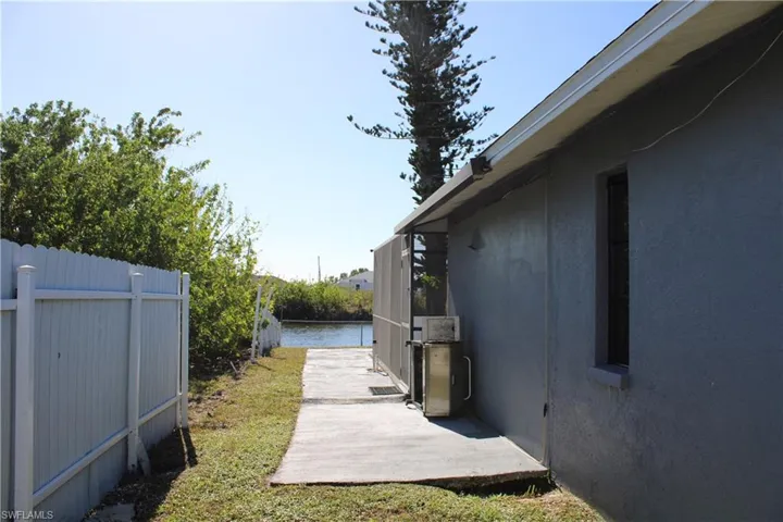 View of yard with a water view