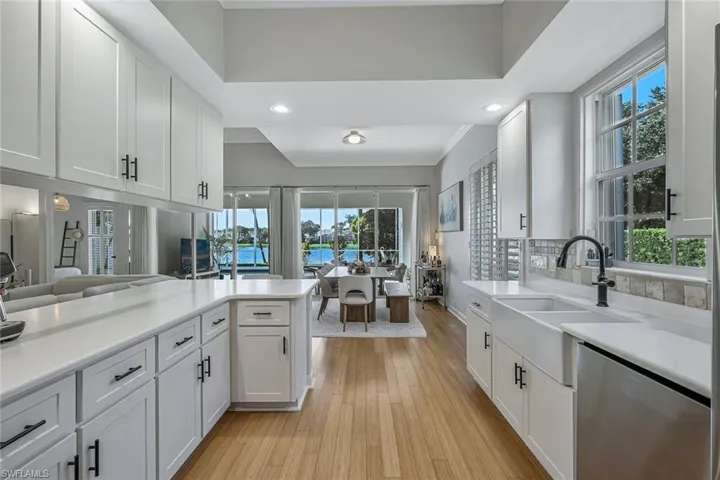 White shaker cabinetry with matte black hardware
