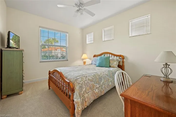 Second bedroom with cozy carpeting and lots of natural light!