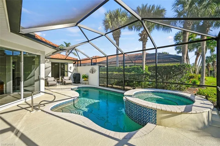 Gorgeous lanai with private heated pool and spa, west facing with preserve and lake views. The sunsets are lovely from your lounge chairs!
