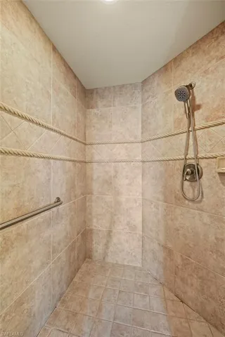 Primary bathroom with updated tile in shower