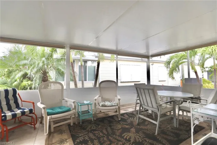 Sunroom featuring a wealth of natural light