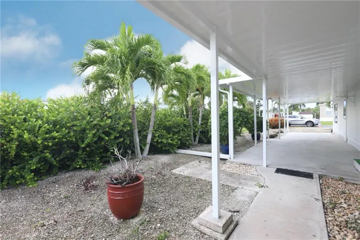 View of yard featuring a carport