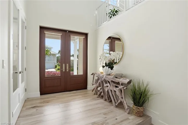Stunning foyer leading to private home office/den