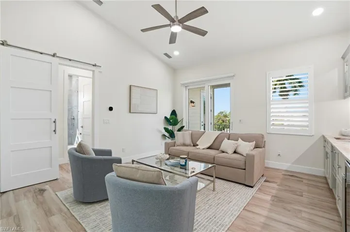 Entry to outdoor balcony, wet bar with dishwasher and beverage center