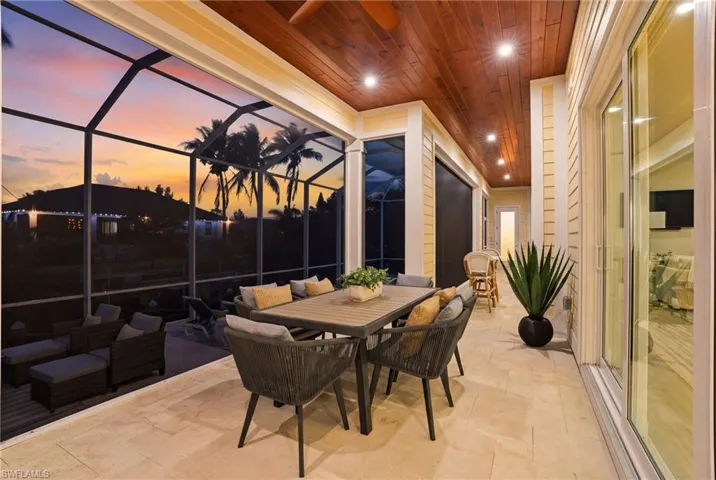 Dining area off outdoor summer kitchen
