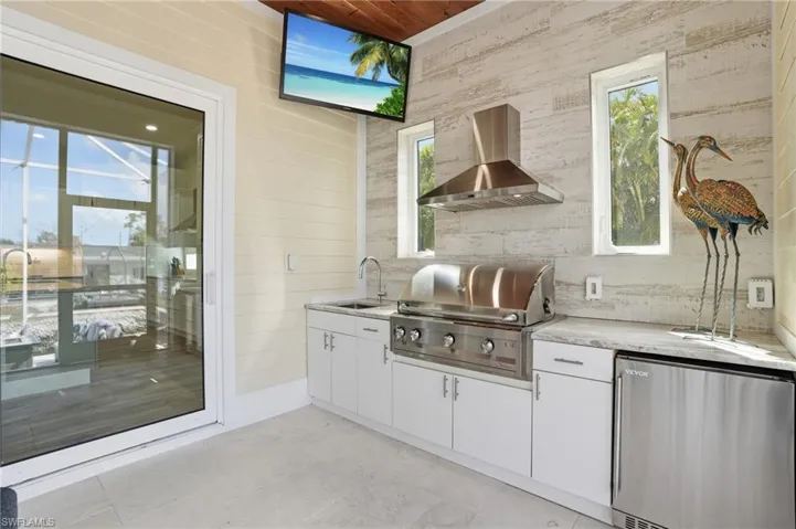 Built in gas grill, fridge