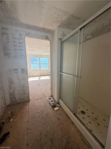 Bathroom featuring a shower stall