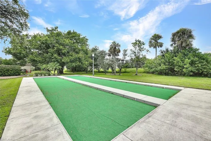 View of home's community featuring a lawn